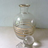 Pair of glass whiskey decanters with gold edging