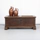 Rustic and weathered antique oak chest from the 18th century.