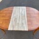 Louis XV oval extendable round table in solid wood and marquetry 160cm