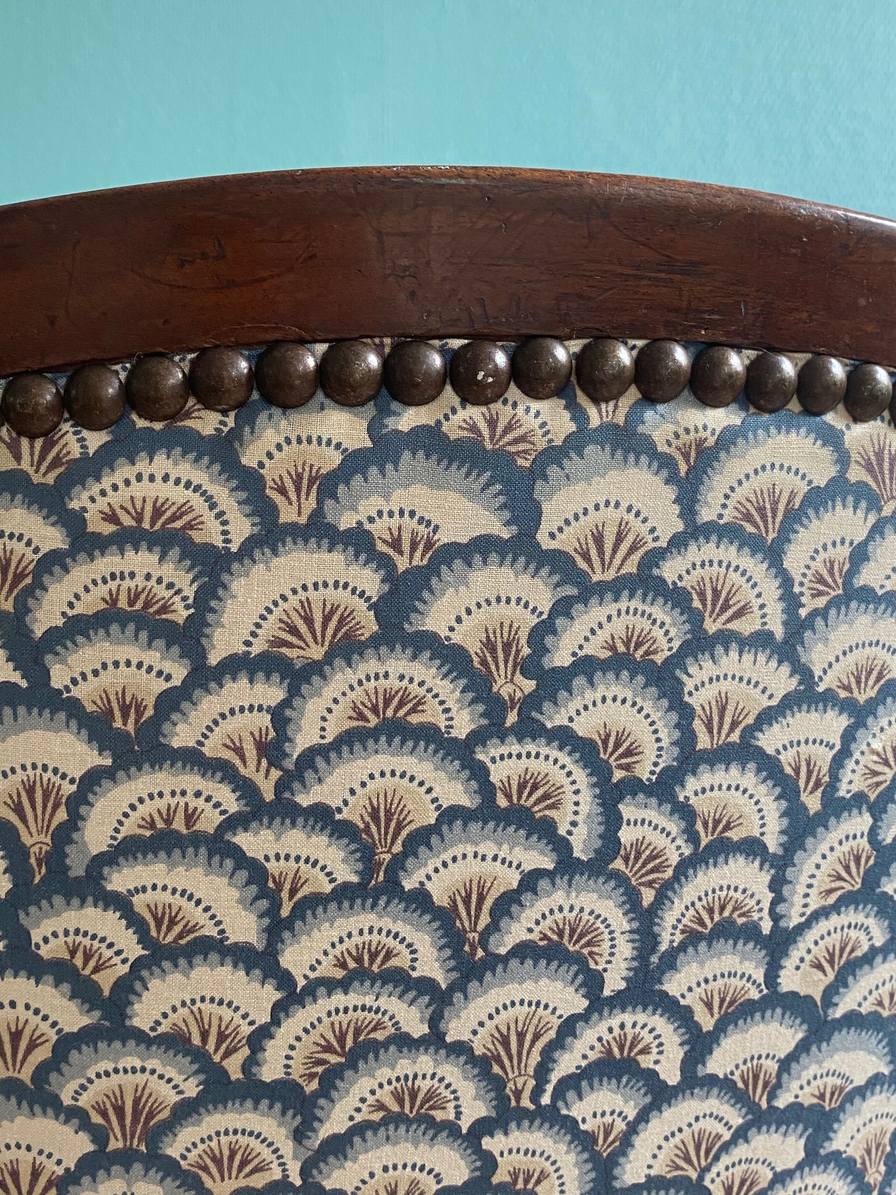 Blue shepherd's chair in mahogany era 19th