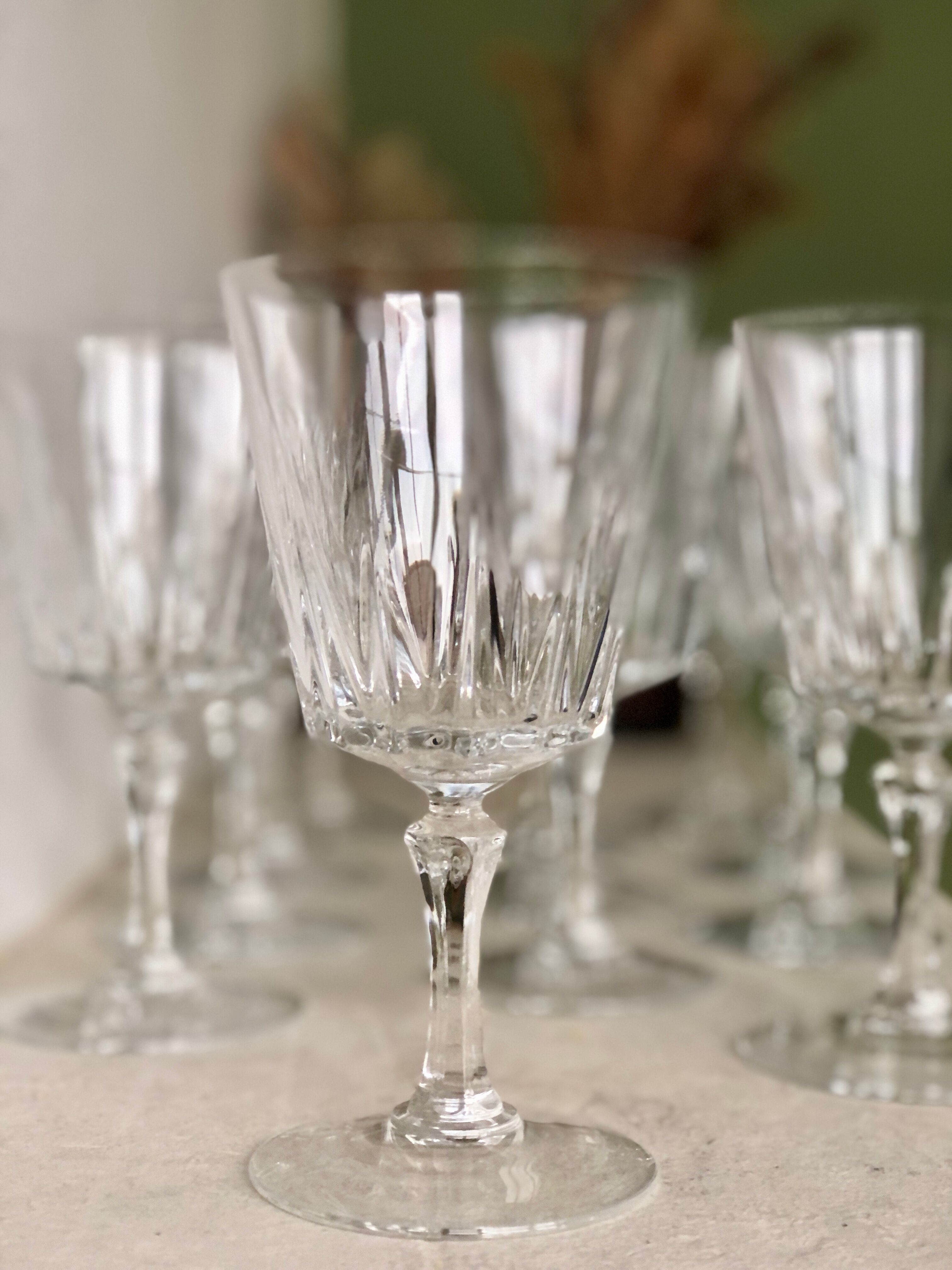 12 glasses with vine/crystal water