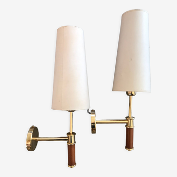 Pair of modernist sconces in wood and gilded metal.