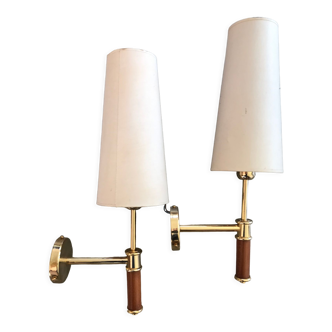 Pair of modernist sconces in wood and gilded metal.