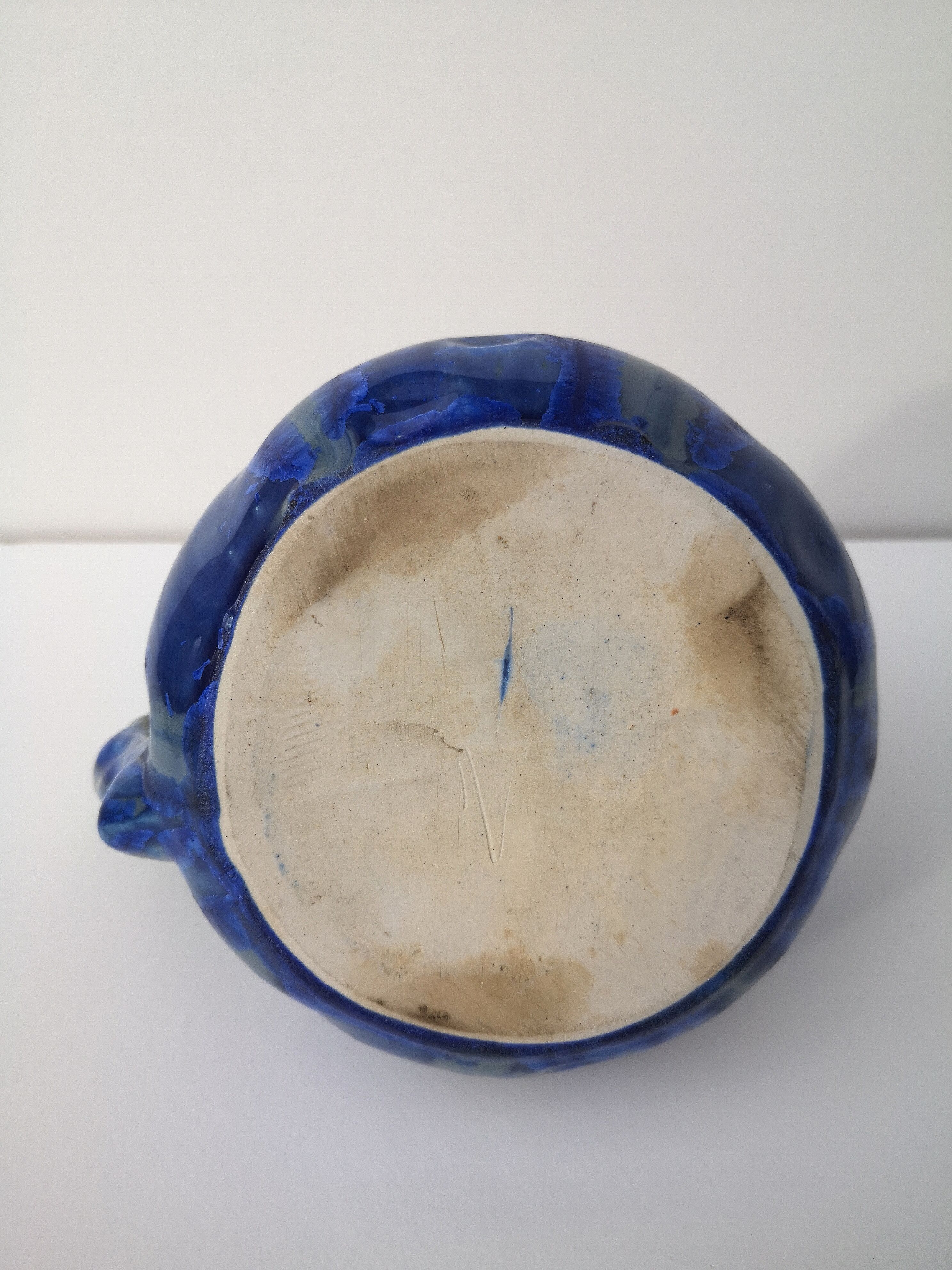 Vintage decanter in enamelled earthenware