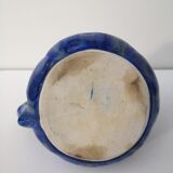 Vintage decanter in enamelled earthenware