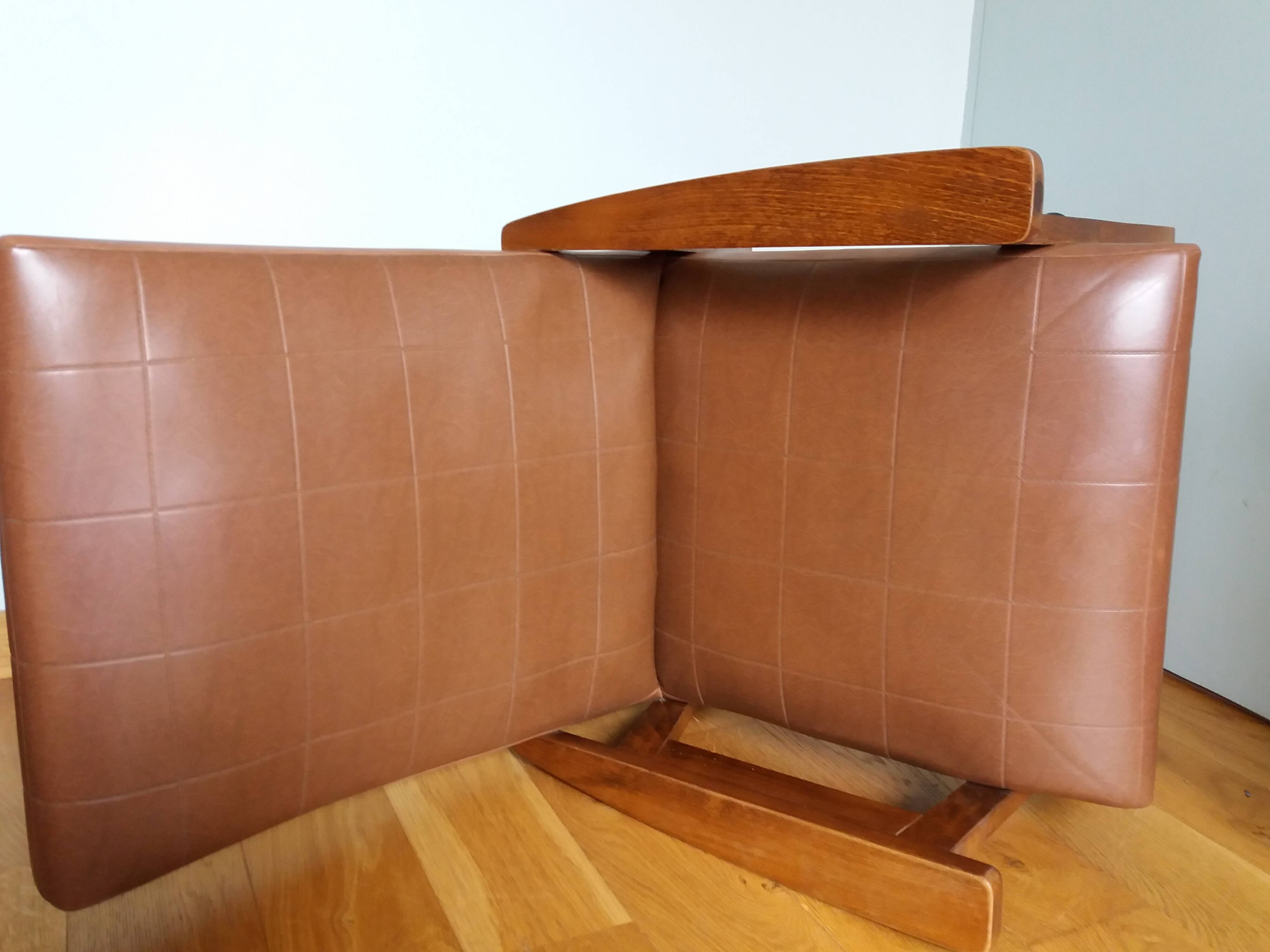 Scandinavian armchair in brown leatherette and wood