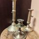 Set of three solid brass candle holders
