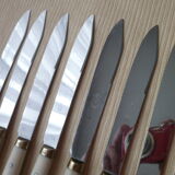 Set of 12 vintage stainless steel bakelite and brass table knives