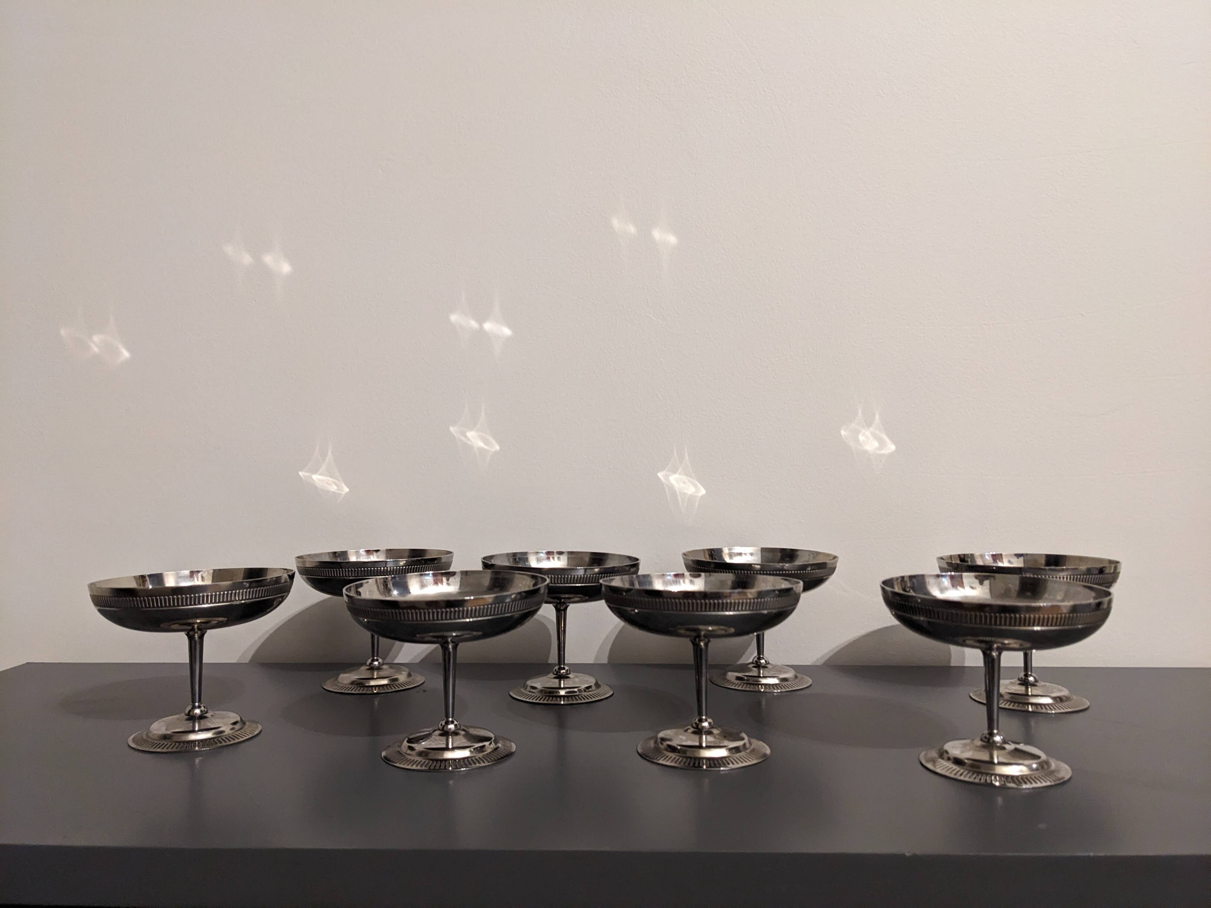 Set of 8 silver metal cups