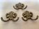 Three double brass coat hooks.