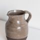 Signed sandstone pitcher