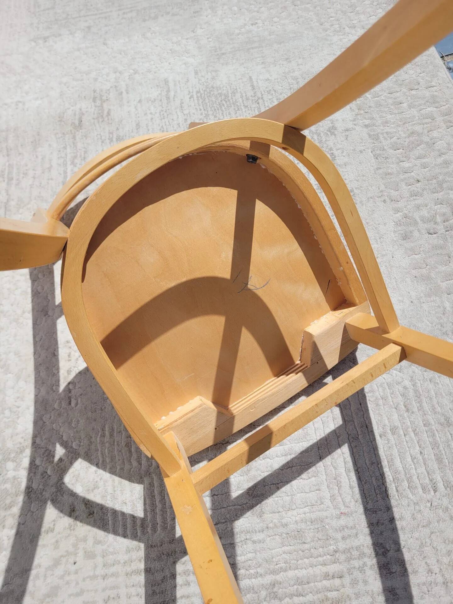 Pair of bistro chairs in light beech.