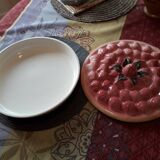 Glazed ceramic dessert plate with strawberry design.