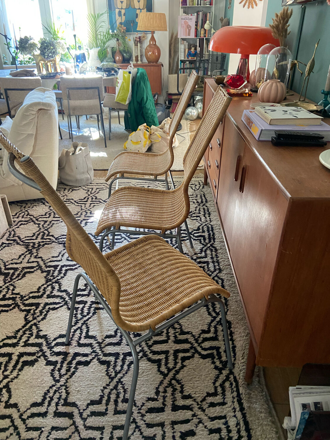 Trio of vintage Ikea rattan and aluminum chairs