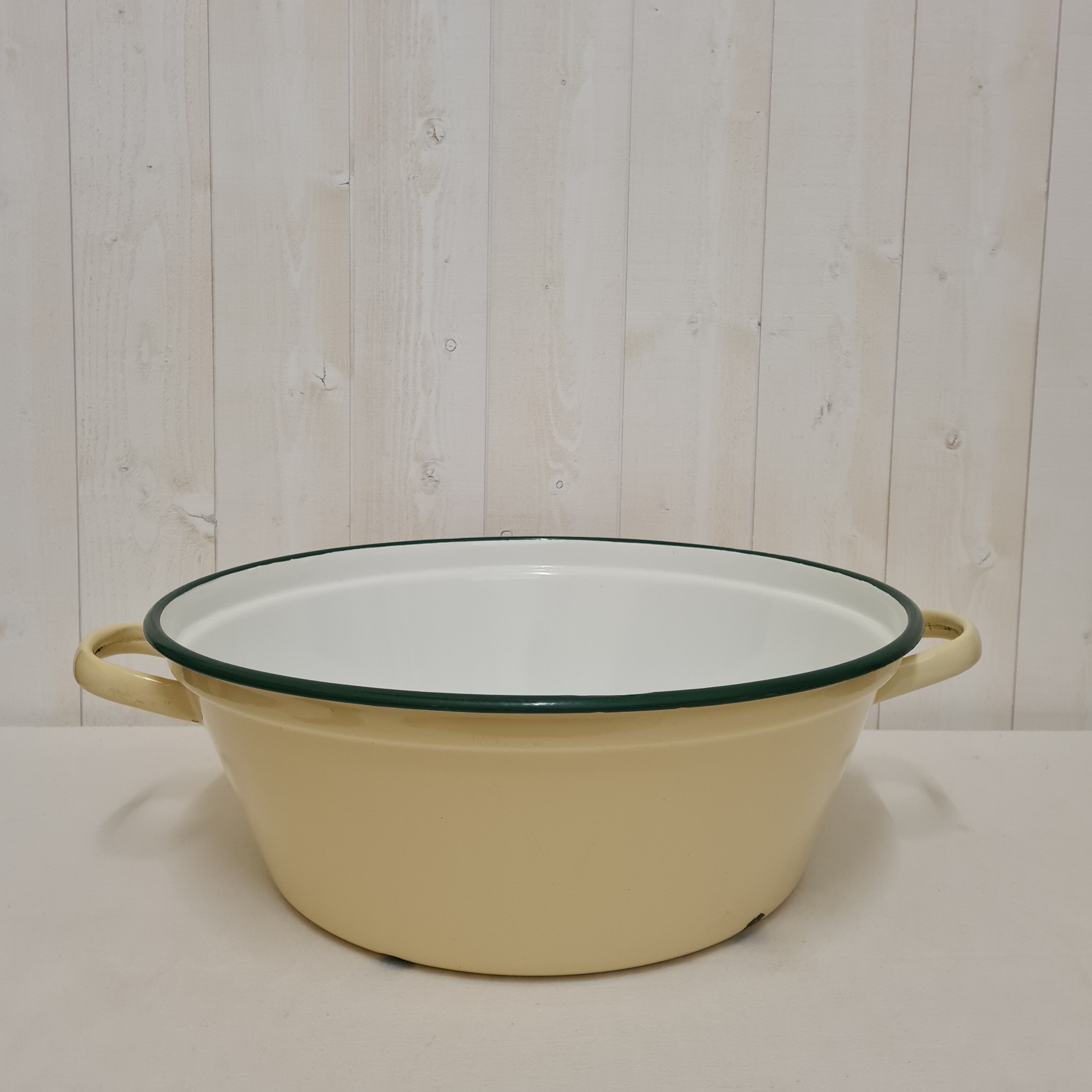 Yellow enamelled sheet metal basin