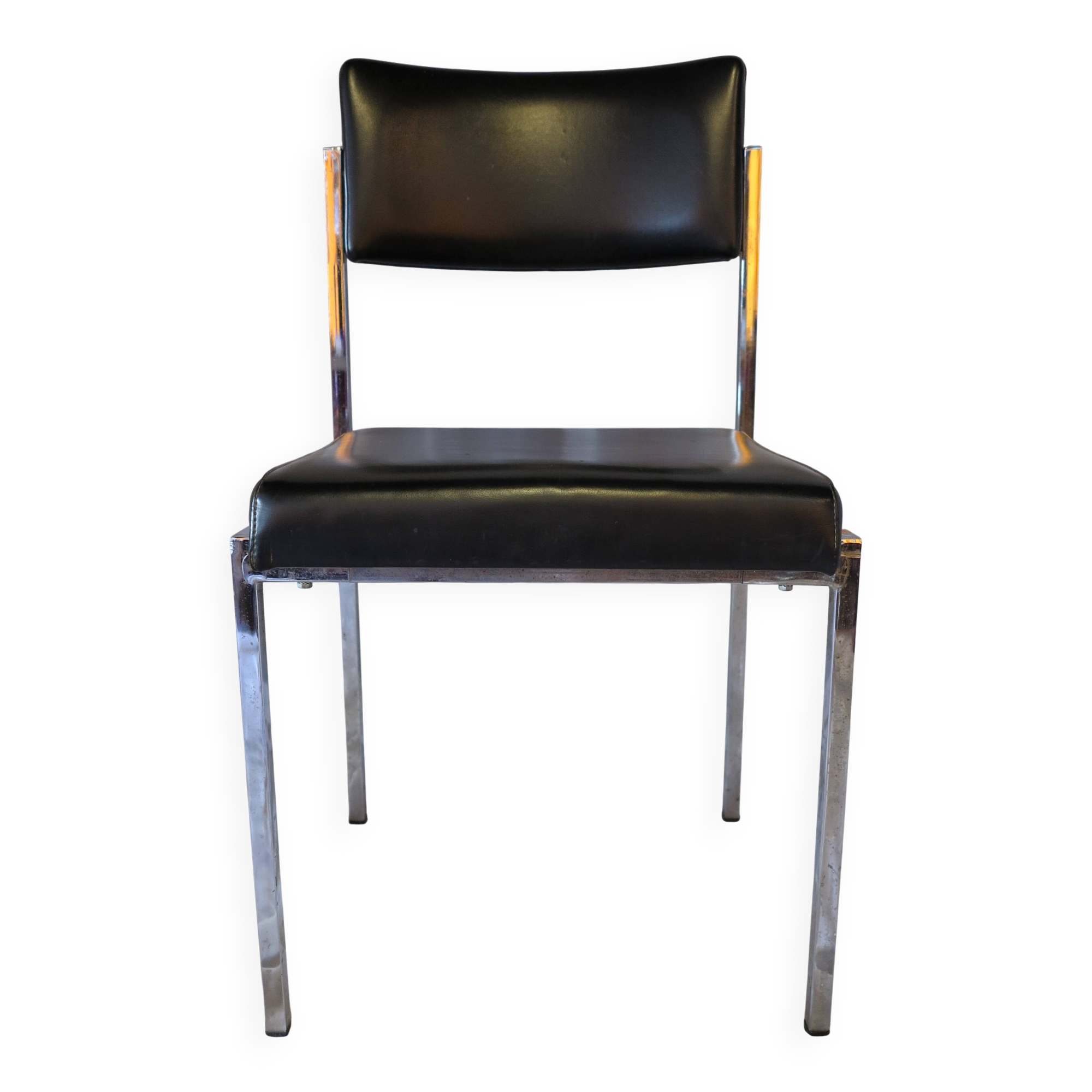 Modernist chair in chromed metal and black imitation leather