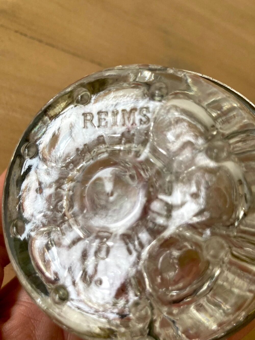 Pique flowers in metal circled glass