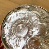 Pique flowers in metal circled glass