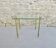 End of sofa, glass and twisted legs in gilded metal