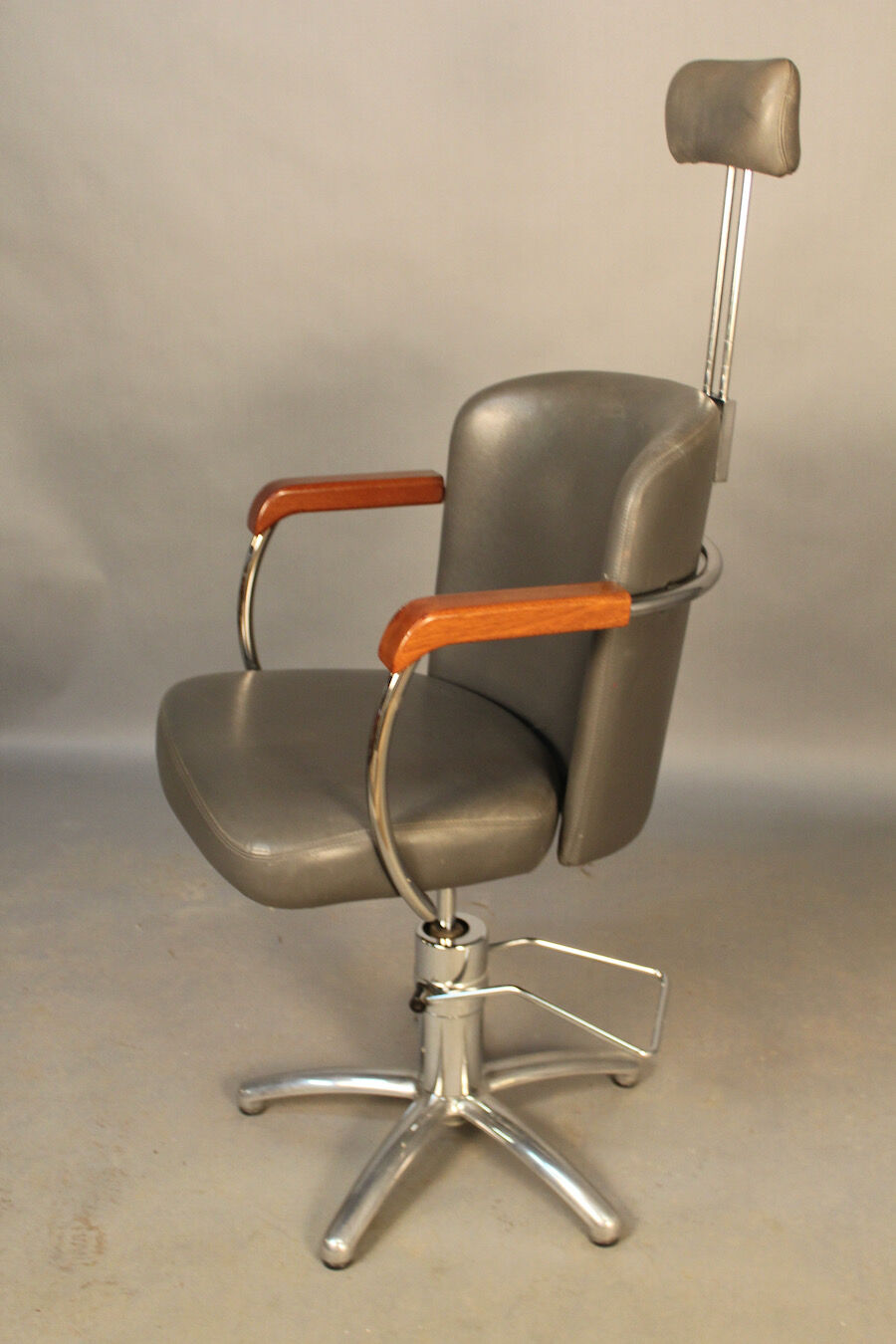 Spotlight hairdresser and her vintage barber chair