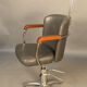 Spotlight hairdresser and her vintage barber chair