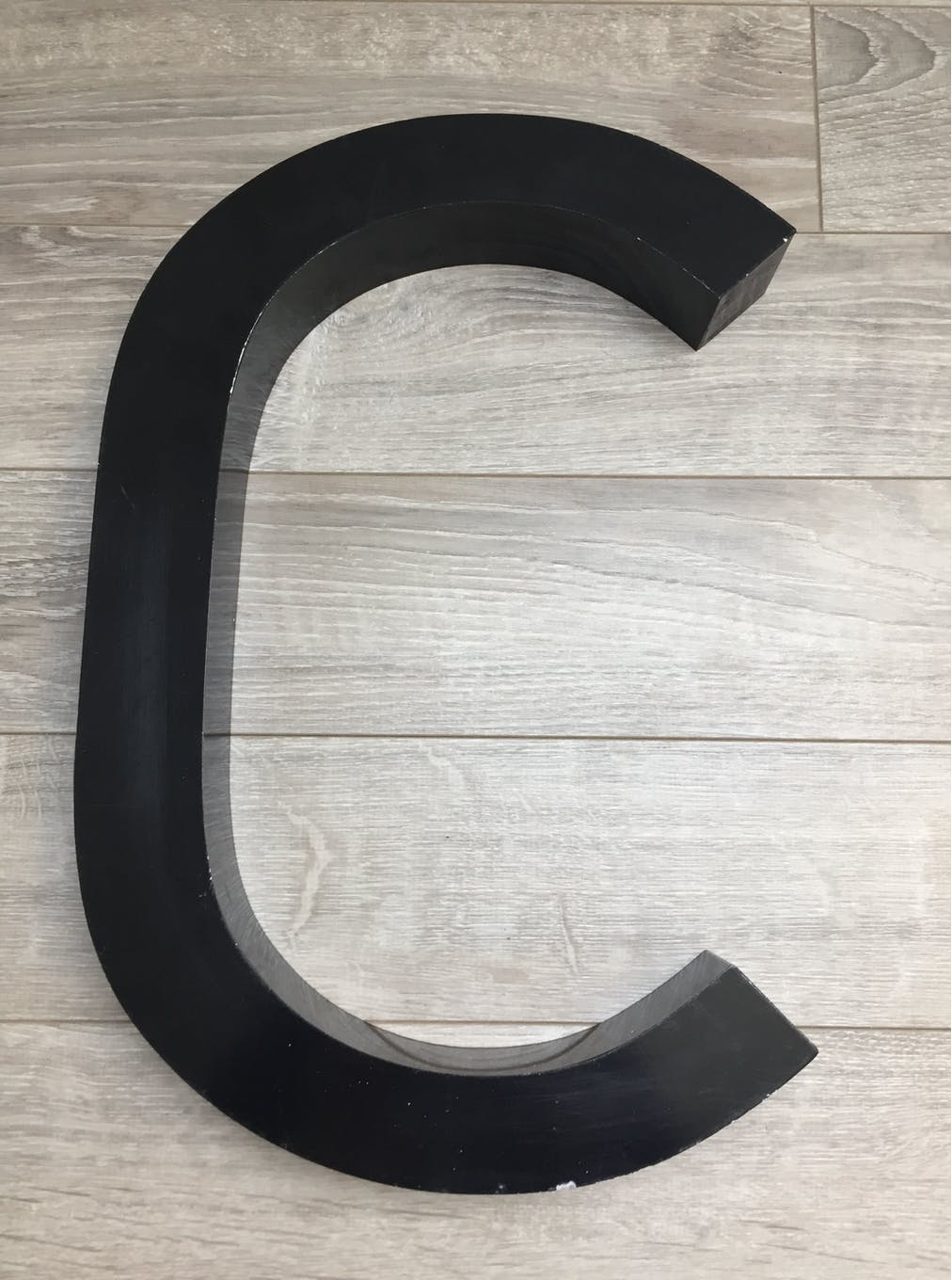 Letter C metal sign