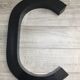 Letter C metal sign