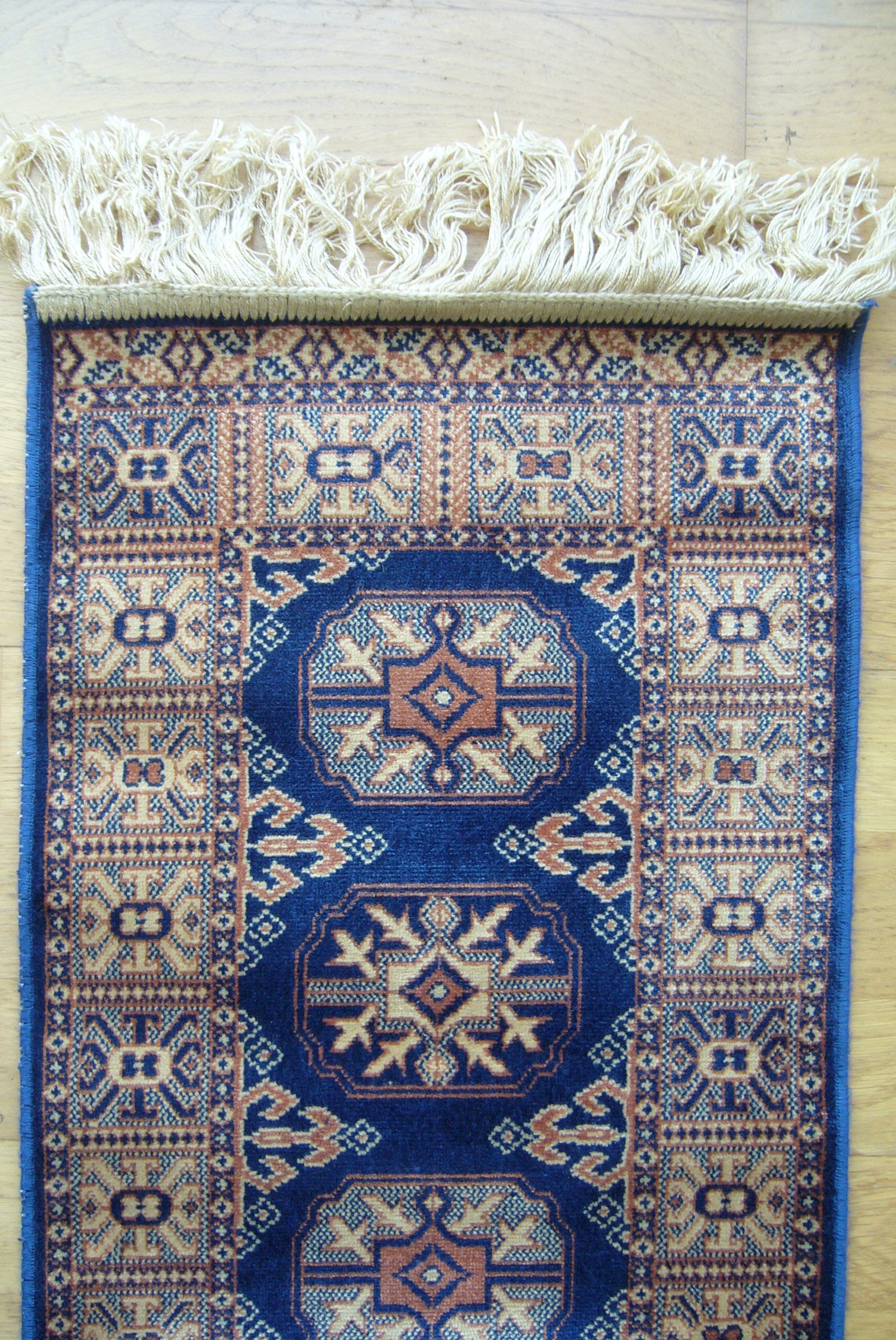 Three oriental rugs 35 x 70 cm