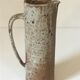 Pitcher in sandstone pyrity of the 60s