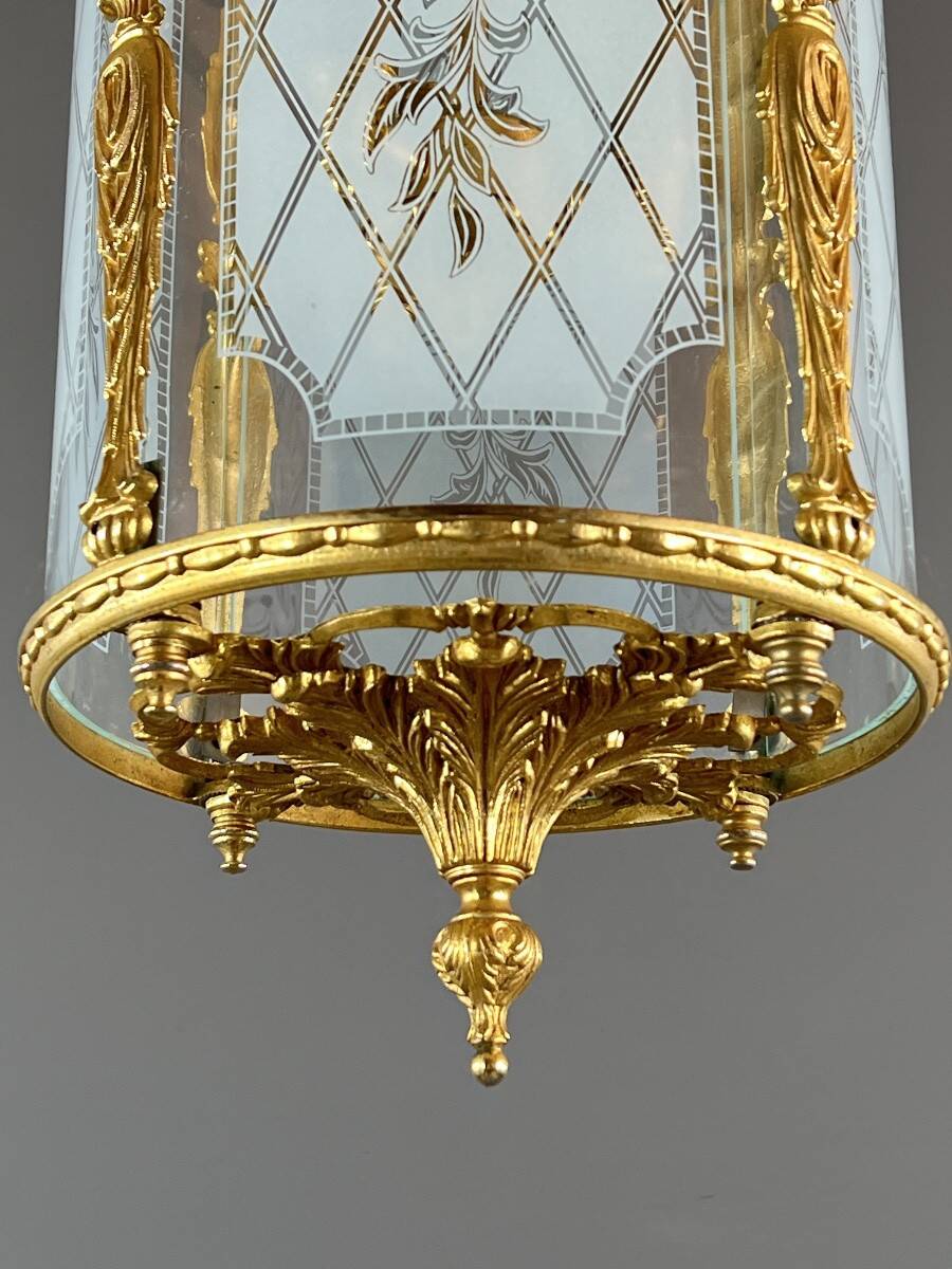 Louis XVI style lantern in gilded bronze and engraved glass, 20th century.