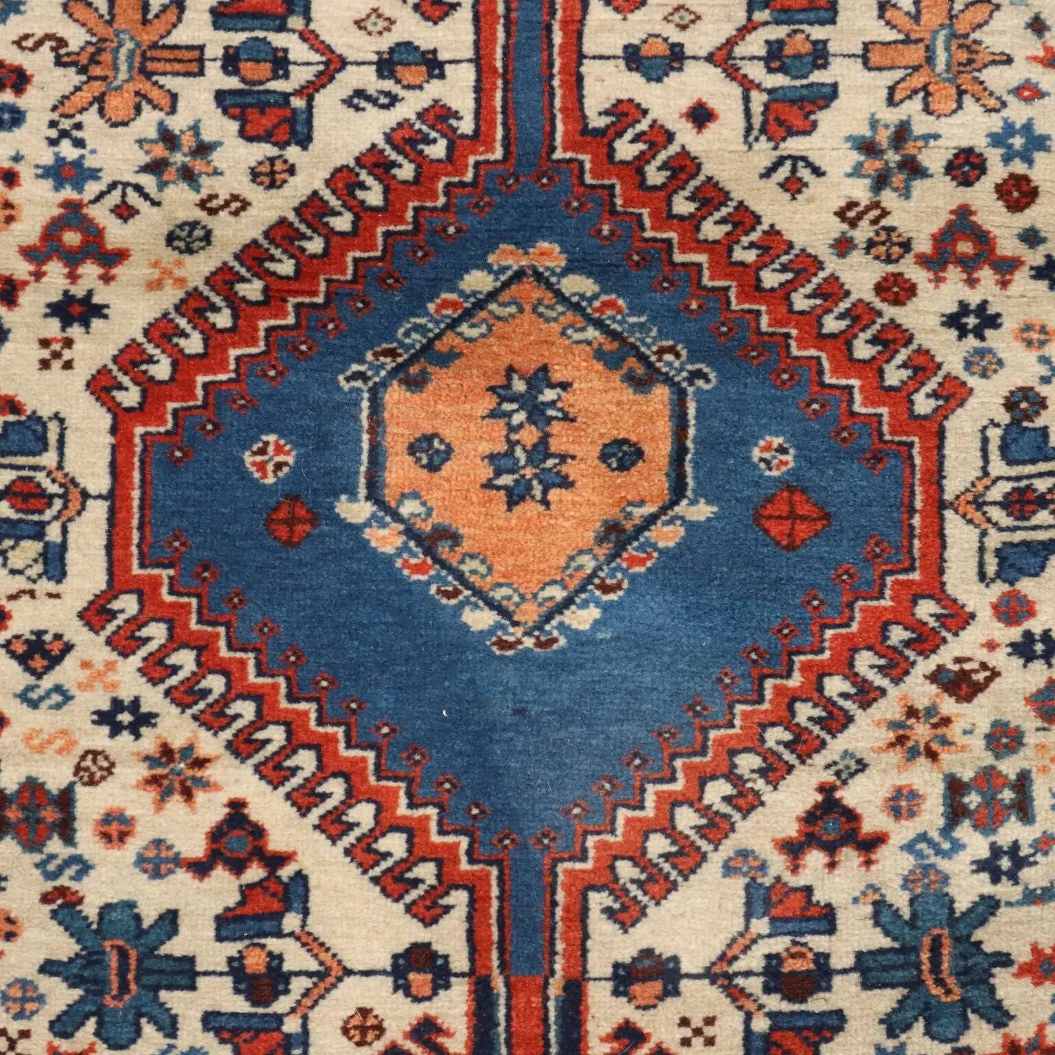 Ancient Asian wool rug, finely knotted, handmade 72 x 33 in.