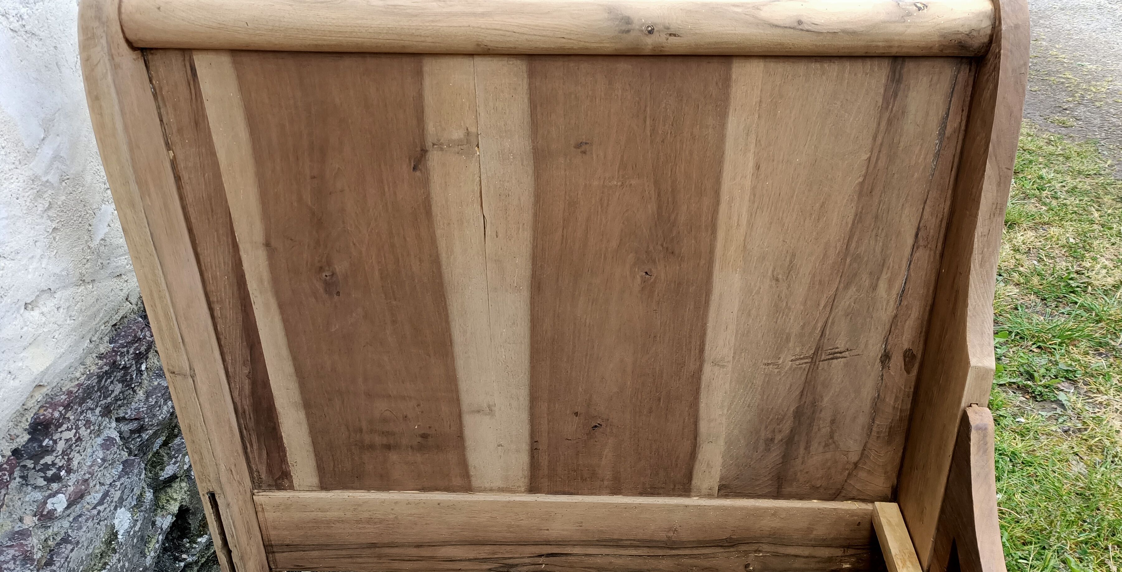 Old bed made of raw wood