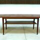 Curved Danish teak coffee table with additional shelf compartment, 1960s