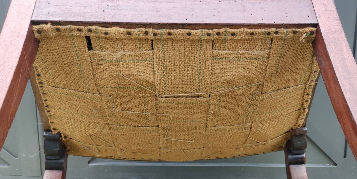 Old green velvet armchair