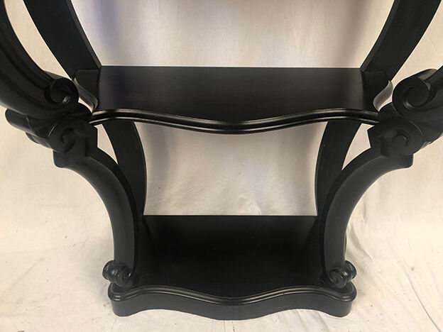 Pair of blackened wooden consoles, marble top