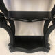Pair of blackened wooden consoles, marble top