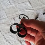 Set of 12 black twisted wrought iron knife holders from the 50s