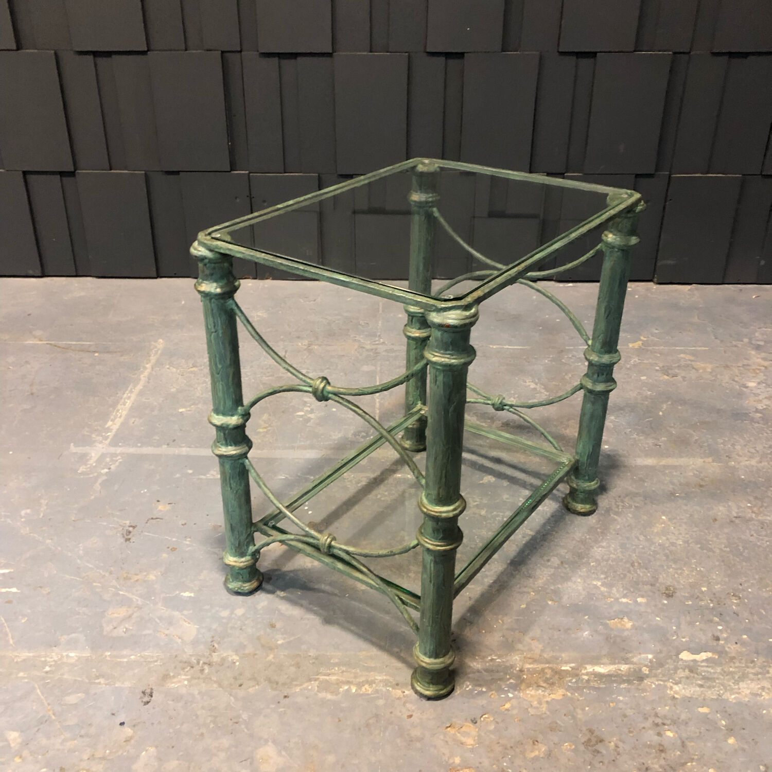 Iron and glass side table with antique patina