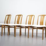 Vintage eetkamerstoelen met nieuwe stoffering in Boucle