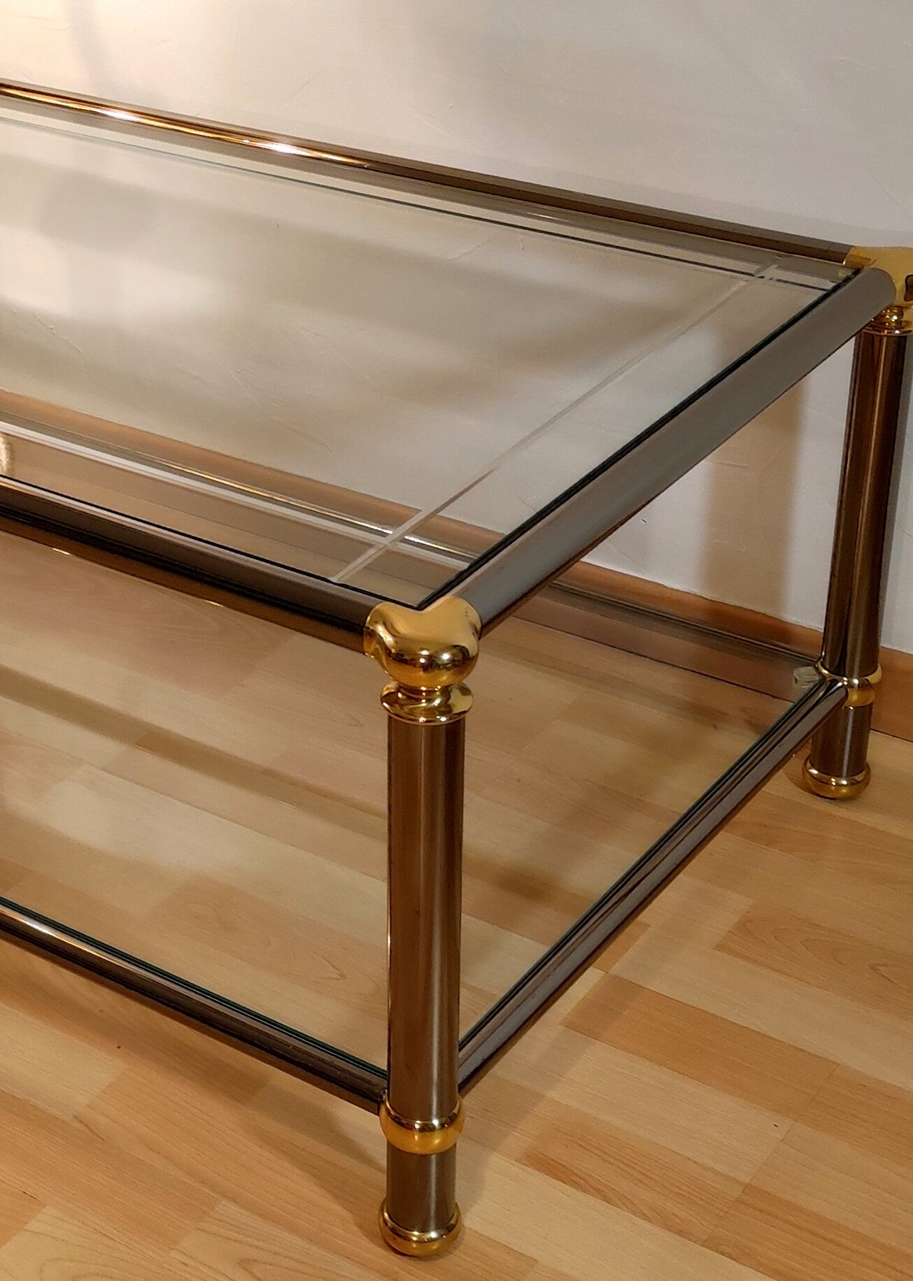 Hollywood regency gold metal & smoked silver coffee table, cut glass
