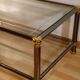 Hollywood regency gold metal & smoked silver coffee table, cut glass