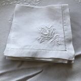 Set of six embroidered linen tea towels