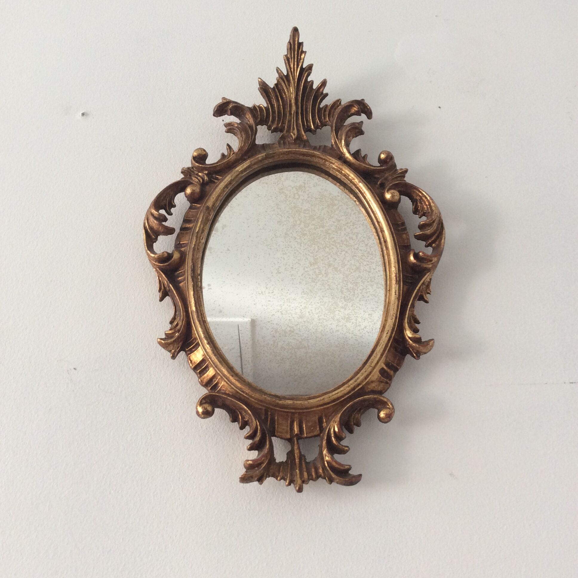 Old mirror in gilded wood 17x12cm