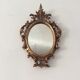 Old mirror in gilded wood 17x12cm