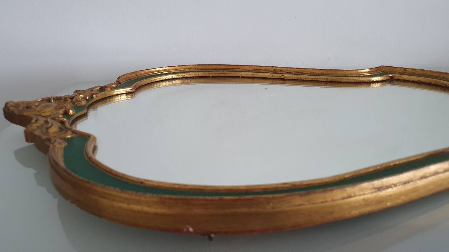 Gold leaf gilded wooden mirror