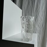 Glass vase with stylized flower pattern