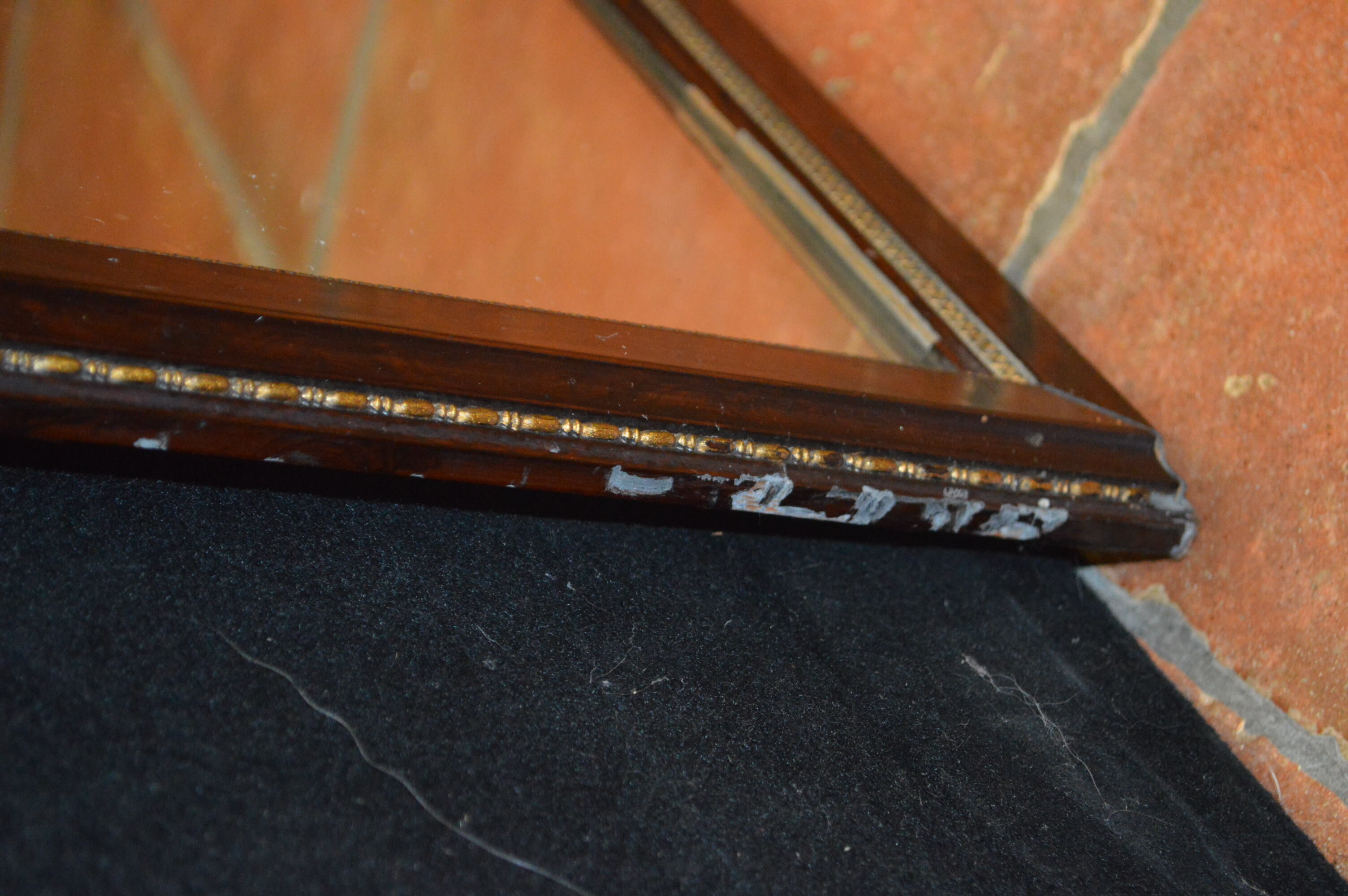 Mirror style restoration enhances brass mahogany