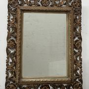 Napoleon III style mirror in carved wood, 20th century.