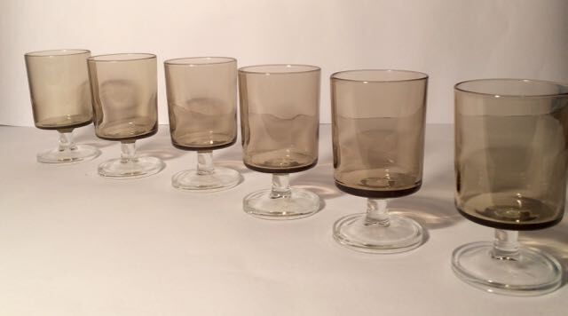 Series of glasses with smoked glass feet