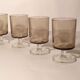 Series of glasses with smoked glass feet